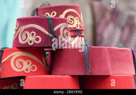 A pile of tradition fez hats in a market in Istanbul, Turkey Stock Photo