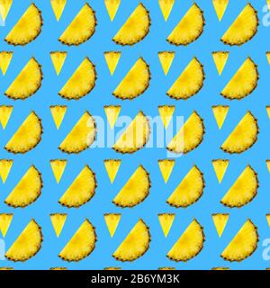 seamless pattern of pineapple pieces on a blue background Stock Photo