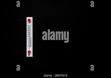 The temperature of the air temperature is on a black background Stock Photo