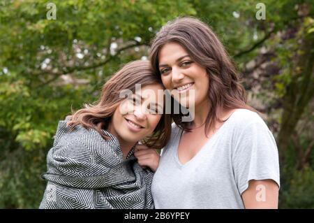 Portrait of two young women smiling Stock Photo