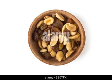 Dried raisins and roasted peanuts in a wooden cup Stock Photo