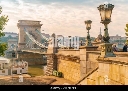 The chain bridge early morning on the Danube and the Castle Buda Stock Photo