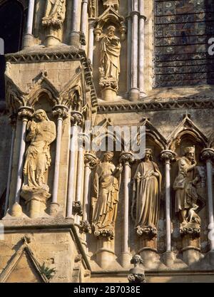 Salisbury Cathedral, detail of statues on West Front, north of West Door. C14th John the Baptist and C19th replacements.   Salisbury Cathedral, Wilt