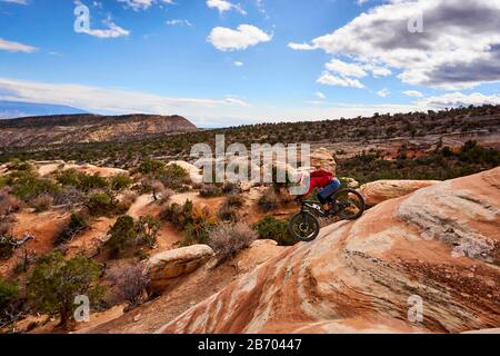 A mountain biker rides  the Ribbon Trail in Grand Junction, Colorado. Stock Photo