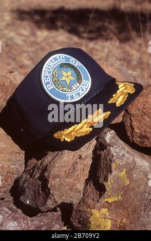 Fort Davis Texas USA, 1997: Ball cap with Republic of Texas logo perched on a rock during the separatist group's standoff with Texas law enforcement officials.  ©Bob Daemmrich Stock Photo