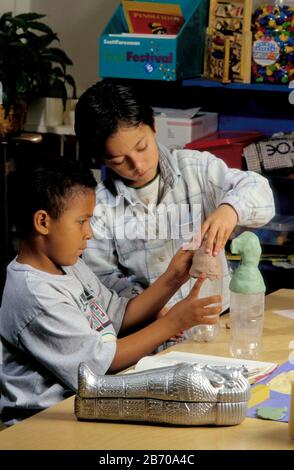 San Antonio, Texas USA: First-grade students create Egyptian-style art as part of their school's C.O.R.E. Knowledge learning stresses art, language, theatre skills & coordination between grades and curriculums. ©Bob Daemmrich Stock Photo