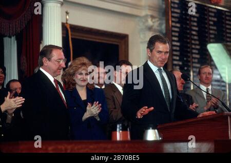 Austin Texas USA, 1997: Texas Gov. George Bush gives his State of the State address to members of the Texas Legislature in the House of Representatives chamber. House Speaker Pete Laney stands on the left. ©Bob Daemmrich Stock Photo