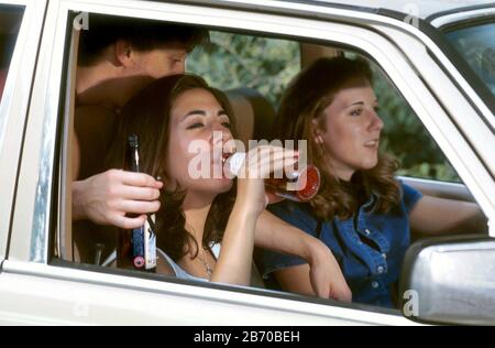 Austin Texas USA, 1997: Teens drinking and driving. MR ©Bob Daemmrich Stock Photo