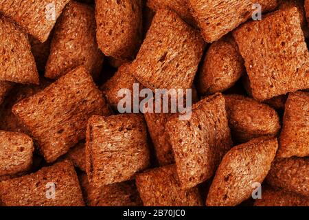 Chocolate pads, sweet breakfast cereal with chocolate filling. Full screen Stock Photo