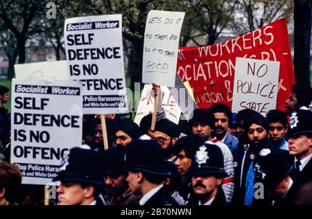 On 11 May 1985, over 2000 people participated in a militant but peaceful demonstration that was allowed to complete its route to Plashet Park. However, in a tense atmosphere, the manhandling by police of one black youth led to confrontation, the emergence of officers on horseback and riot officers who charged into the park. It appeared that this had been deliberately engineered: three to four white men in ordinary clothes were seen throwing sticks at the police; but were later seen behind police lines with police radios. Later, riot officers paraded along Green Street and East ham High Street Stock Photo