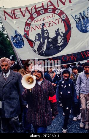 On 11 May 1985, over 2000 people participated in a militant but peaceful demonstration that was allowed to complete its route to Plashet Park. However, in a tense atmosphere, the manhandling by police of one black youth led to confrontation, the emergence of officers on horseback and riot officers who charged into the park. It appeared that this had been deliberately engineered: three to four white men in ordinary clothes were seen throwing sticks at the police; but were later seen behind police lines with police radios. Later, riot officers paraded along Green Street and East ham High Street Stock Photo