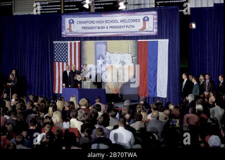 Crawford Texas USA, November 2001: Pres. George W. Bush holds press conference with Russian Pres. Vladimir Putin in the Crawford High school gym during a meeting between the two world leaders at Bush's ranch near Crawford  ©Bob Daemmrich
