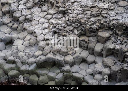 Texture Basaltic Volcanic Columnar Joints Coast in JungMun in Jeju Island, South Korea. Stock Photo