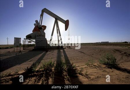 Lamesa, Dawson County, Texas USA: Pumpjack at site of oil well in north Permian Basin.  ©Bob Daemmrich Stock Photo