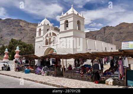 Santa Ana church with market in front at Maca Stock Photo