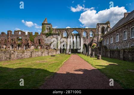 The ruins of the Cistercian Aulne Abbey, nestled on the right bank of the Sambre, Stock Photo