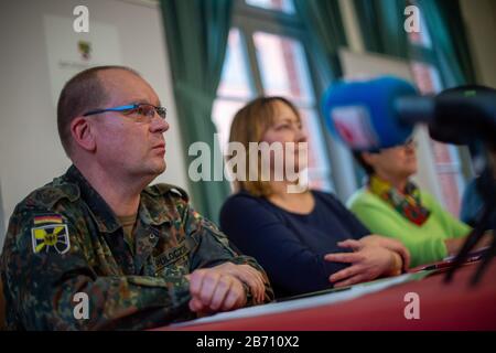 Magdeburg, Germany. 10th Mar, 2020. Lieutenant Colonel Thomas Poloczek (l), press spokesman of the Saxony-Anhalt State Command, and Carina Helmeke, department head at the State Office for Consumer Protection, sit on the podium of a press conference on the spread of the corona virus in Saxony-Anhalt. Credit: Klaus-Dietmar Gabbert/dpa-Zentralbild/ZB/dpa/Alamy Live News Stock Photo