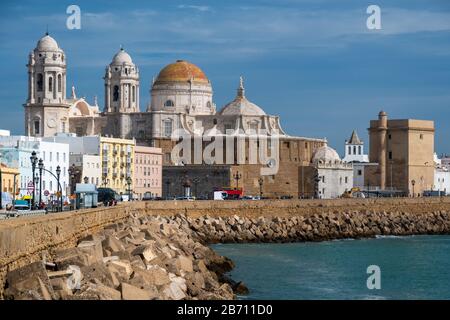 Cadiz Cathedral and the coast in Spain at sunset Stock Photo