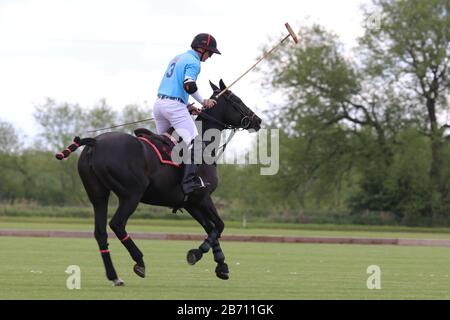 Solo rider warming up before a polo match Stock Photo