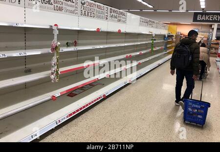 Empty shelves in the bread aisle in a Tesco store in Dublin. Stock Photo