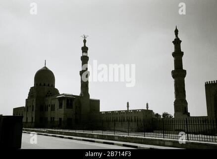 Black And White Travel Photography - Emir Qurqumas Complex and Mosque in the City of the Dead in Cairo in Egypt in North Africa Middle East Stock Photo