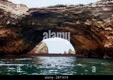 Cave arch at Ballestas Islands, Paracas Stock Photo