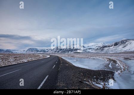 Rod through beautiful winter landscape in Iceland Stock Photo
