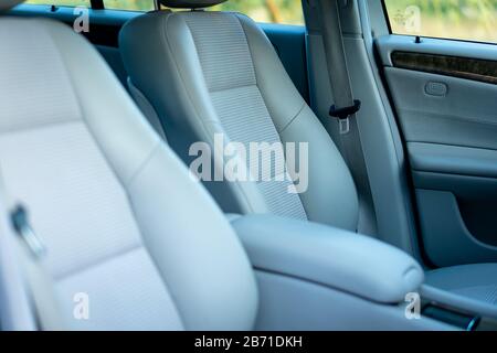 Leather interior design, car passenger and driver seats, clean, angle view side Stock Photo