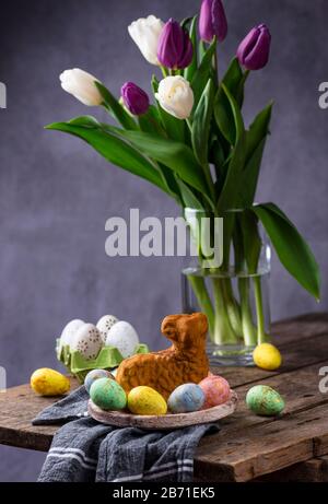 Easter background with tulips and eggs Stock Photo