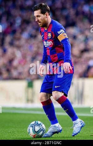 BARCELONA - MAR 7: Lionel Messi plays at the La Liga match between FC Barcelona and Real Sociedad de Futbol at the Camp Nou Stadium on March 7, 2020 i Stock Photo