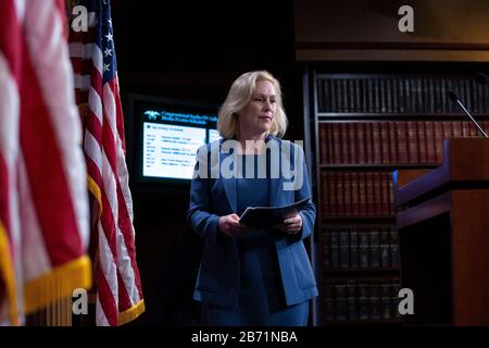 United States Senator Kirsten Gillibrand (Democrat of New York), arrives to a news conference at the United States Capitol in Washington, DC, U.S., on Thursday, March 12, 2020. Gillibrand, along with United States Senator Cory Booker (Democrat of New Jersey) and United States Senator Kamala Harris (Democrat of California), is working on legislation that would ensure paid sick leave to deal with the Coronavirus. Credit: Stefani Reynolds/CNP /MediaPunch Stock Photo