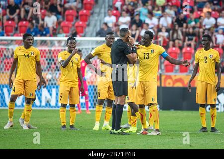 TYCHY, POLAND - JUNE 7, 2019: U-20 World Cup Poland 2019 1/4 finals Match Italy vs Mali 4:2. Referee Ismail Elfath during VAR verification, Clement Ka Stock Photo