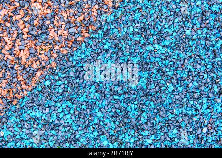 Texture of asphalt road background with colored pebbles, Abstract background, selective focus Stock Photo