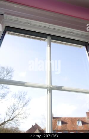 Double glazing window with open trickle vents Stock Photo Alamy