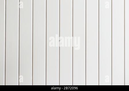 A white wooden boards in vertical position, for background or sample carpentry and construction work Stock Photo