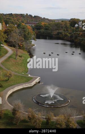 scenic view from top of clinton dam in clinton ma october 2019 showing water fountain and fall foliage Stock Photo