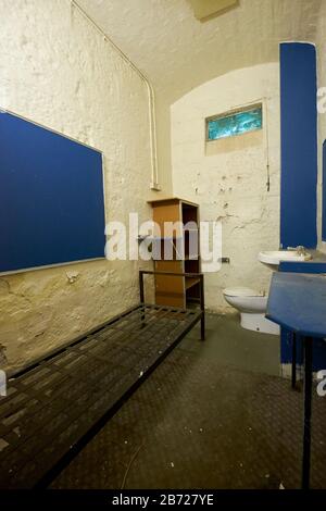 A solitary, single cell at the old Gaol (jail). In Beechworth, Victoria, Australia. Stock Photo