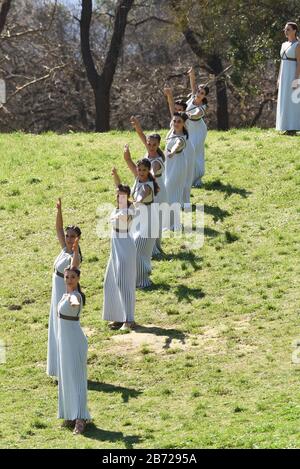 Ancient Olympia, Greece. 12th Mar, 2020. During the ceremony of the torch relay. (Photo by Dimitrios Karvountzis/Pacific Press) Credit: Pacific Press Agency/Alamy Live News Stock Photo