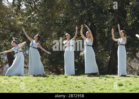 Ancient Olympia, Greece. 12th Mar, 2020. During the ceremony of the torch relay. (Photo by Dimitrios Karvountzis/Pacific Press) Credit: Pacific Press Agency/Alamy Live News Stock Photo