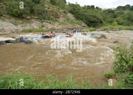 Durban, KwaZulu-Natal, South Africa, people, sport, events, 2 adult males paddling kayak in 2020 Duzi Canoe Marathon, contains logos, boat, canoeing Stock Photo