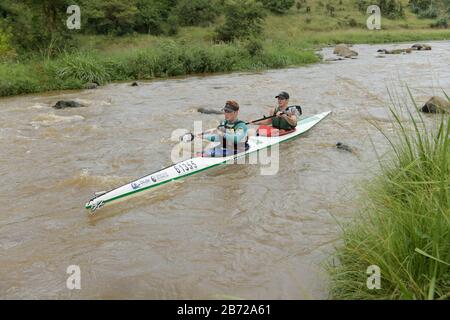 Durban, South Africa, people, sport, 2 adult male competitors paddling kayak in 2020 Duzi Canoe Marathon event, contains logos, Valley of 1000 Hills Stock Photo