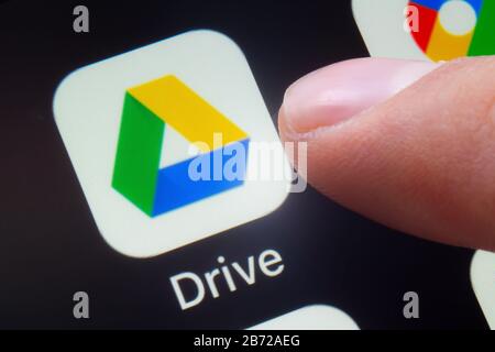 Calgary, Alberta, Canada. March 12, 2020. A person about to use the Google Drive application which is a file storage and synchronization service Stock Photo