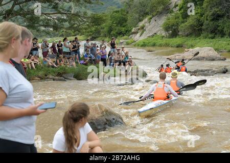 Durban, South Africa, people, spectators looking at competitors paddling canoes, 2020 Duzi Canoe Marathon, Mission Rapids, contains logos, sport Stock Photo