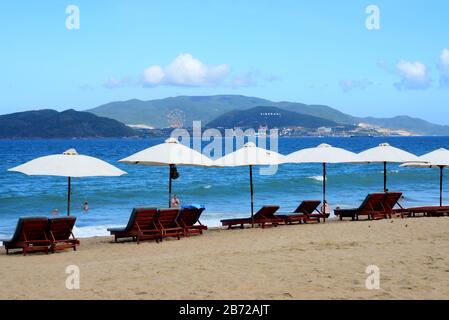 NHA TRANG, VIETNAM – 29 FEBRUARY 2020 : nha trang beach behind is an Vinpearl Land Stock Photo