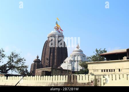 Lord Sri jagannath temple puri south gate view closeup historical famous place with blue sky and trees in day light beautiful location wallpaper trave Stock Photo