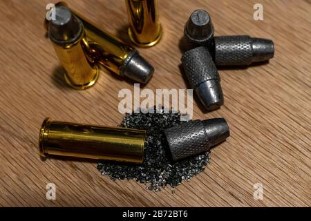 Macro photo of handgun ammunition that has been disassembled into main components Stock Photo