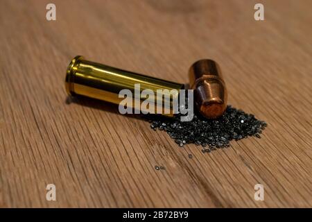 Macro photo of handgun ammunition that has been disassembled into main components Stock Photo