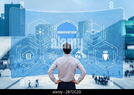 Innovation concept with researcher working on emerging technologies to develop innovative products. Digital disruption with IoT, robotic process autom Stock Photo
