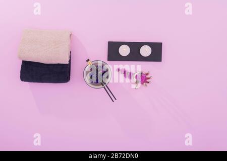 Bowl and chopsticks with towels and spa decorations Stock Photo