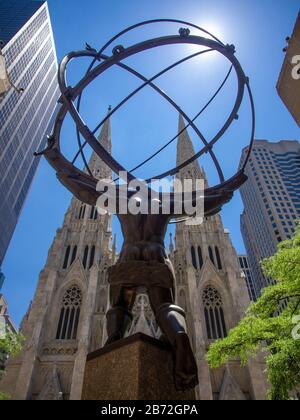 Atlas Statue at Rockefeller Center and St. Patrick's Cathedral Stock Photo